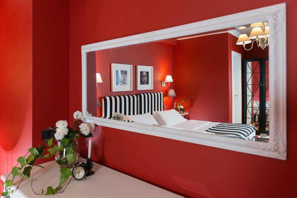 Postel nebo postele na pokoji v ubytování Areela Boutique Hotel