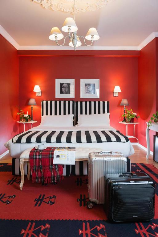 Postel nebo postele na pokoji v ubytování Areela Boutique Hotel