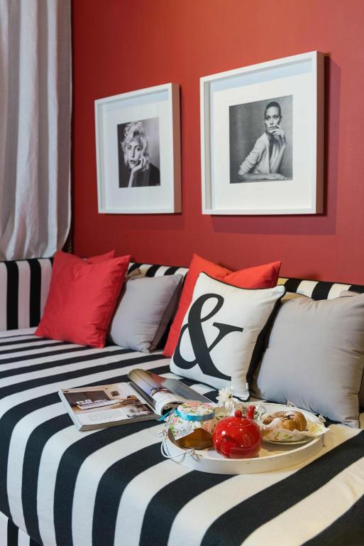 Postel nebo postele na pokoji v ubytování Areela Boutique Hotel