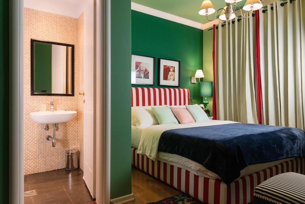 Postel nebo postele na pokoji v ubytování Areela Boutique Hotel