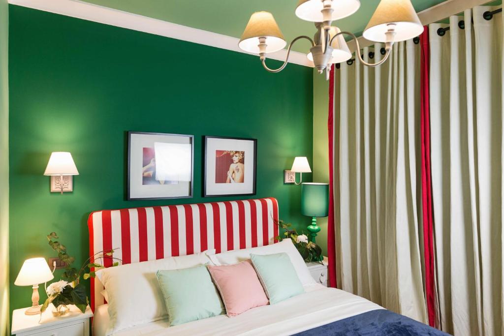 Postel nebo postele na pokoji v ubytování Areela Boutique Hotel