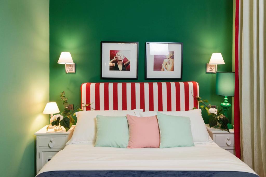 Postel nebo postele na pokoji v ubytování Areela Boutique Hotel