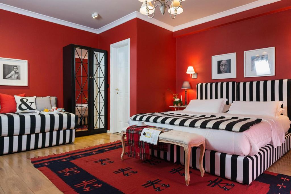 Postel nebo postele na pokoji v ubytování Areela Boutique Hotel