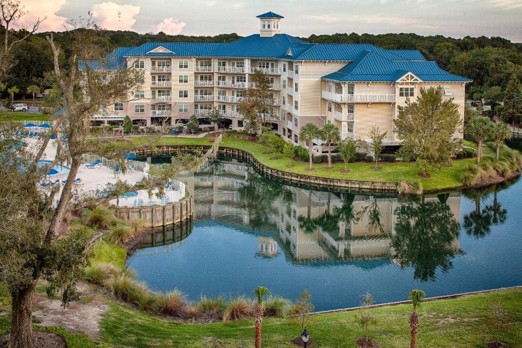 an aerial view of a resort with a lake at Bluewater by Spinnaker Resorts in Hilton Head Island