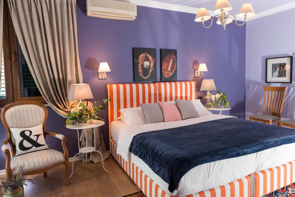 Postel nebo postele na pokoji v ubytování Areela Boutique Hotel