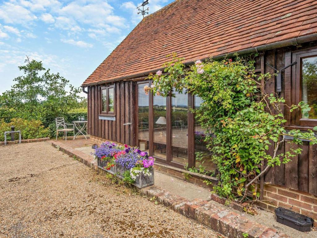 an external view of a house with a garden at 1 Bed in Battle oc-94675 in Warbleton