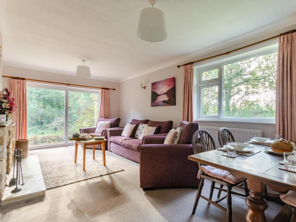 a living room with a couch and a table at 2 Bed in Dereham oc-shrn8 in East Dereham
