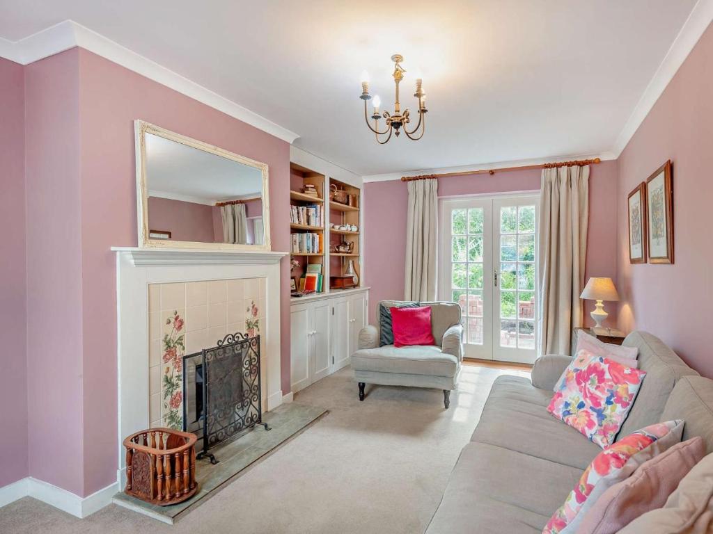 a living room with a couch and a fireplace at 2 Bed in Colchester oc-42650 in Dedham
