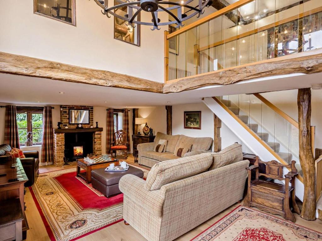 a living room filled with furniture and a fireplace at 2 Bed in Thetford oc-57885 in Saham Toney