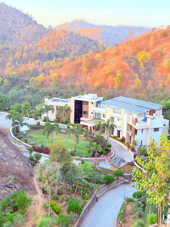 an aerial view of a resort in the mountains at Hotel Anan Palace in Ābu Road