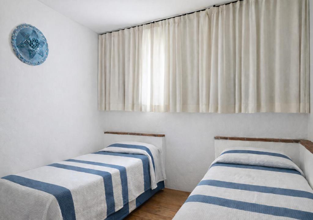 Hotel Resort & Spa Baia Caddinas - Suite Familiare