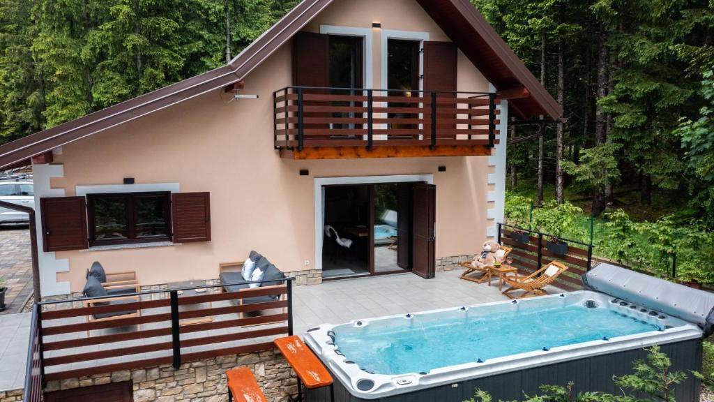 an aerial view of a house with a swimming pool at Casa Foresta by Villas Guide in Mrkopalj