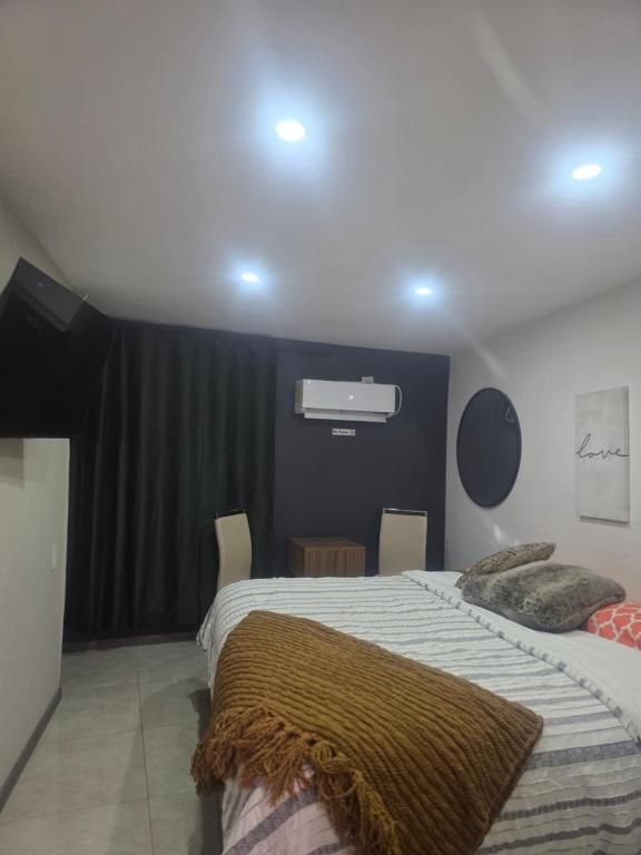 Ліжко або ліжка в номері Suite mateo