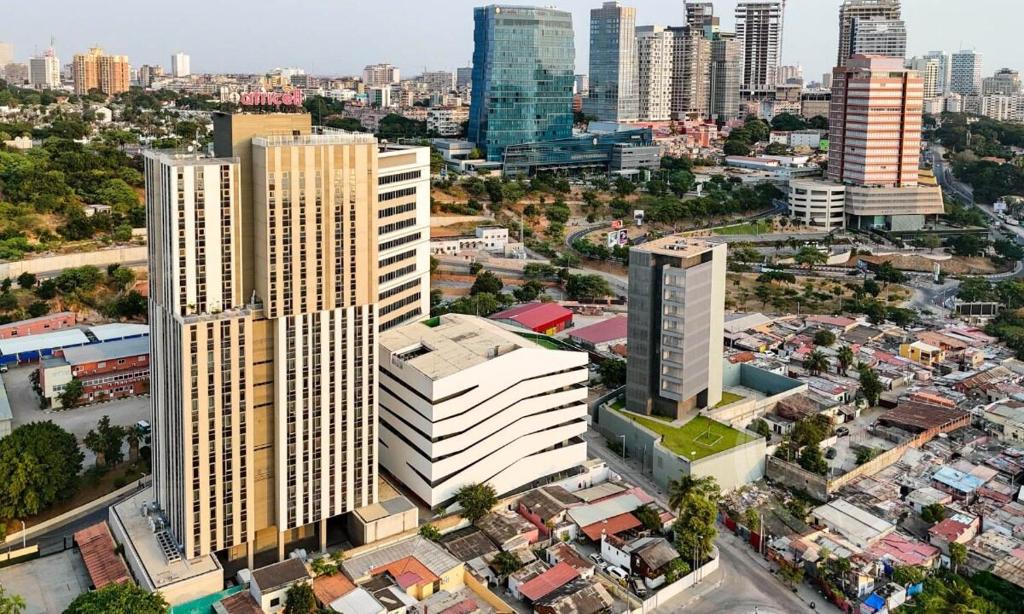 an overhead view of a city with tall buildings at Edifício Kings Tower T2-06 in Luanda