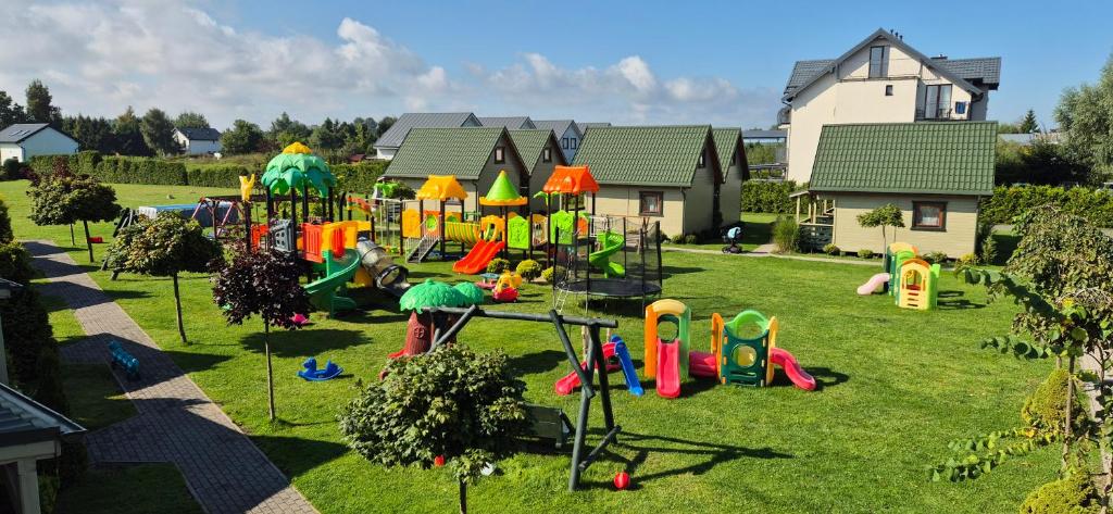 an aerial view of a playground in a yard at Domki Balos in Karwia