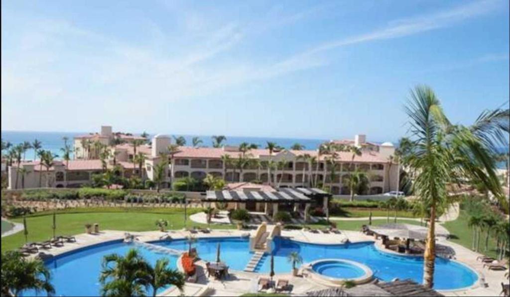 a view of a pool at a resort at Beautifully Maintained 2-Bed Condo in Las Mañanitas in San José del Cabo