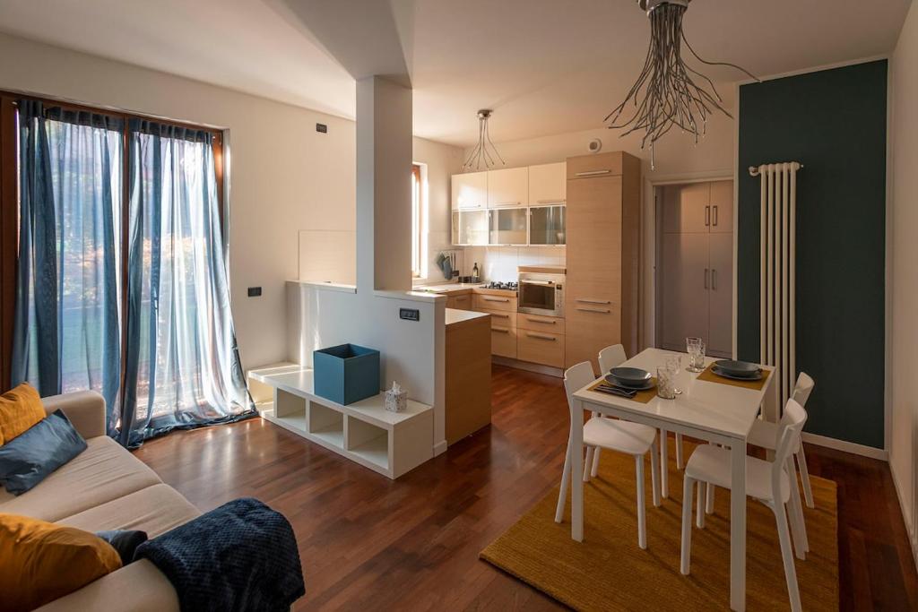 a living room with a couch and a table at La Casetta di Gio in Busnago