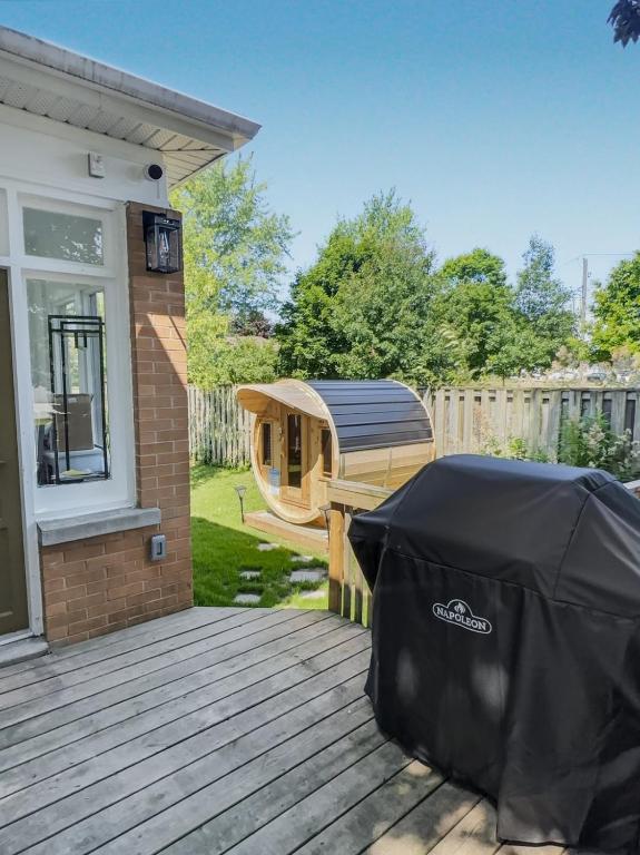 a roped off deck with a gazebo on a house at Walkerton Sauna Suite in Walkerton