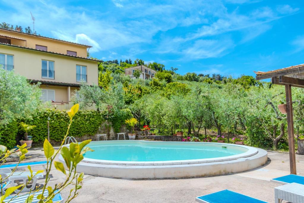 a pool in the backyard of a villa at B&B La Bufalona - Pool & Relax in Massa Marittima