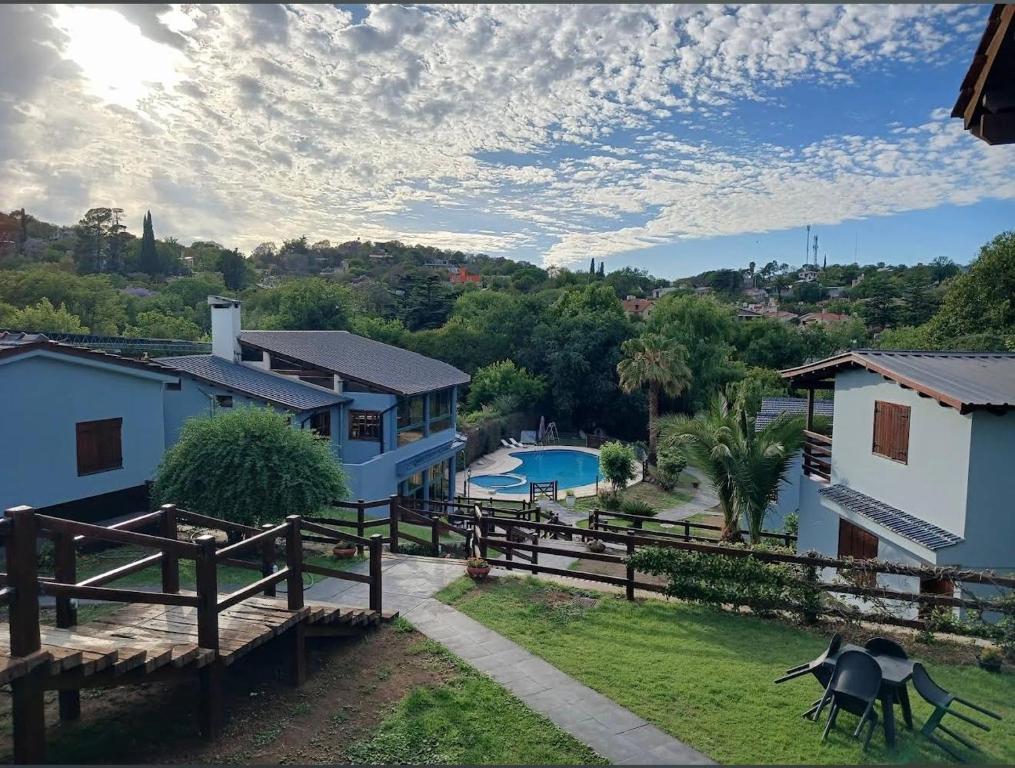 an aerial view of a house with a fence at Sole Luna in Río Ceballos