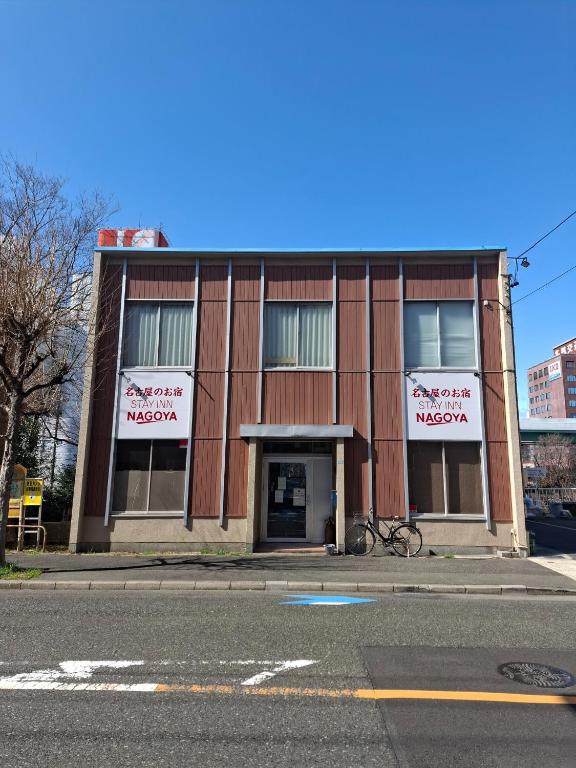 a building with a bike parked in front of it at Nagoya - Hotel - Vacation STAY 01596v in Nagoya