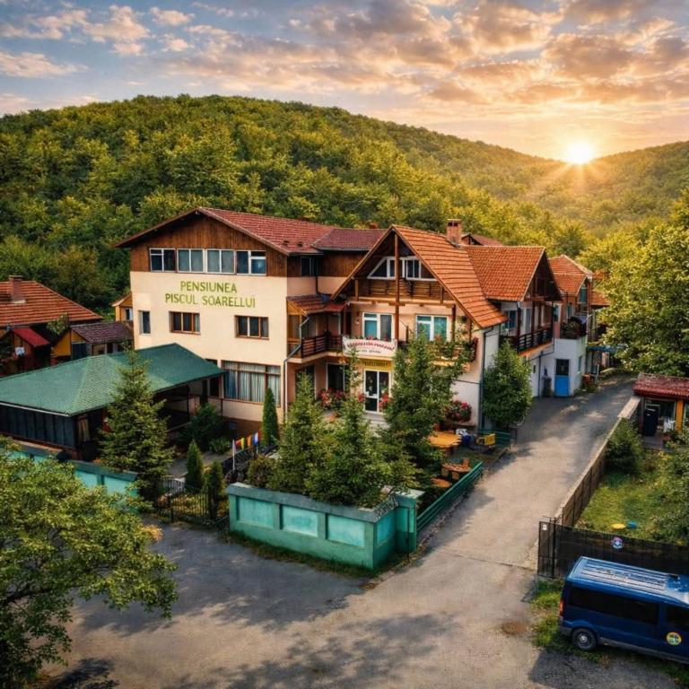 an aerial view of a resort in the mountains at Pensiunea Agroturistică Piscul Soarelui in Capu Piscului