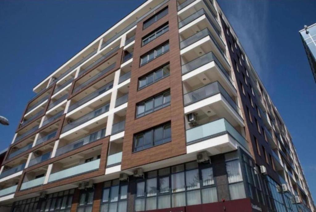 a tall building with windows on the side of it at Tower II in Banja Luka