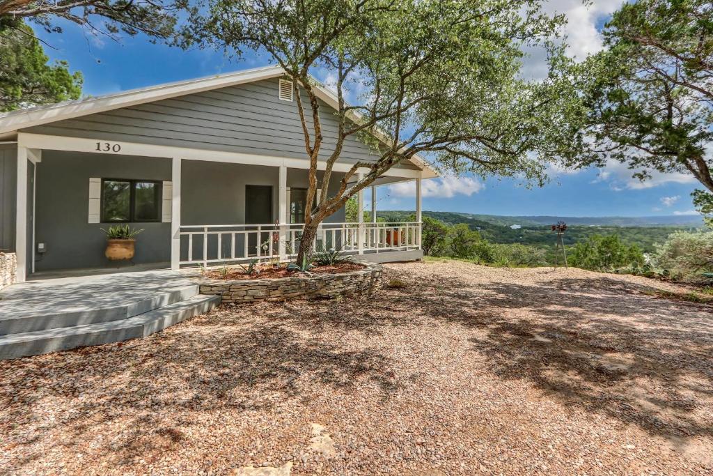 a home with a large yard in front of a house at Casa Cielo in Wimberley