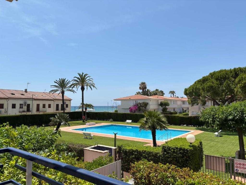 a view from the balcony of a villa with a swimming pool at ALTAFULLA MAR Pescadors in Altafulla