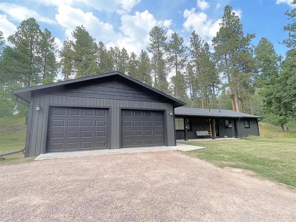 a building with a garage door on the side of it at Keystone Crossing in Keystone