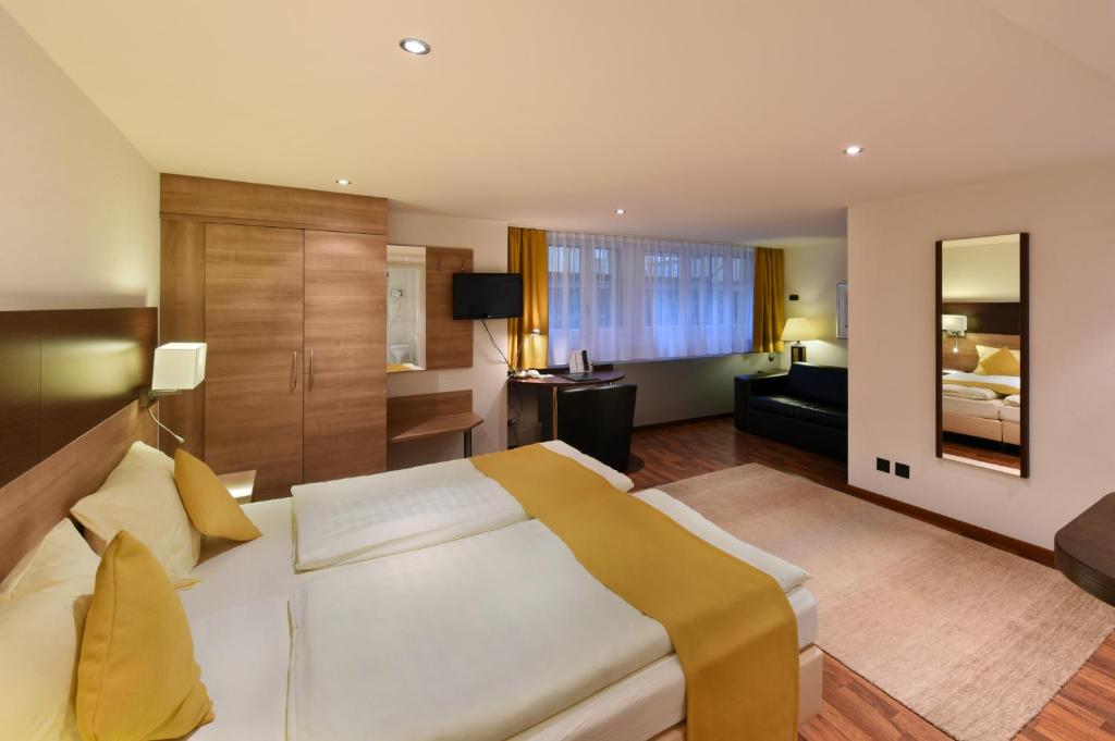 Postel nebo postele na pokoji v ubytování Hotel Engel