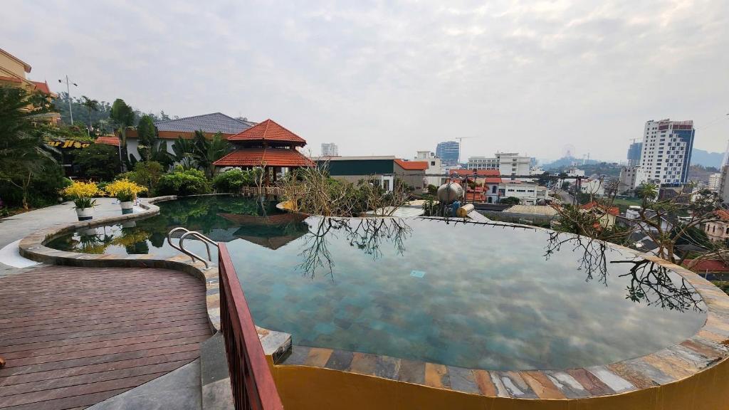a large swimming pool on top of a building at Orestay Garden Hạ Long in Ha Long
