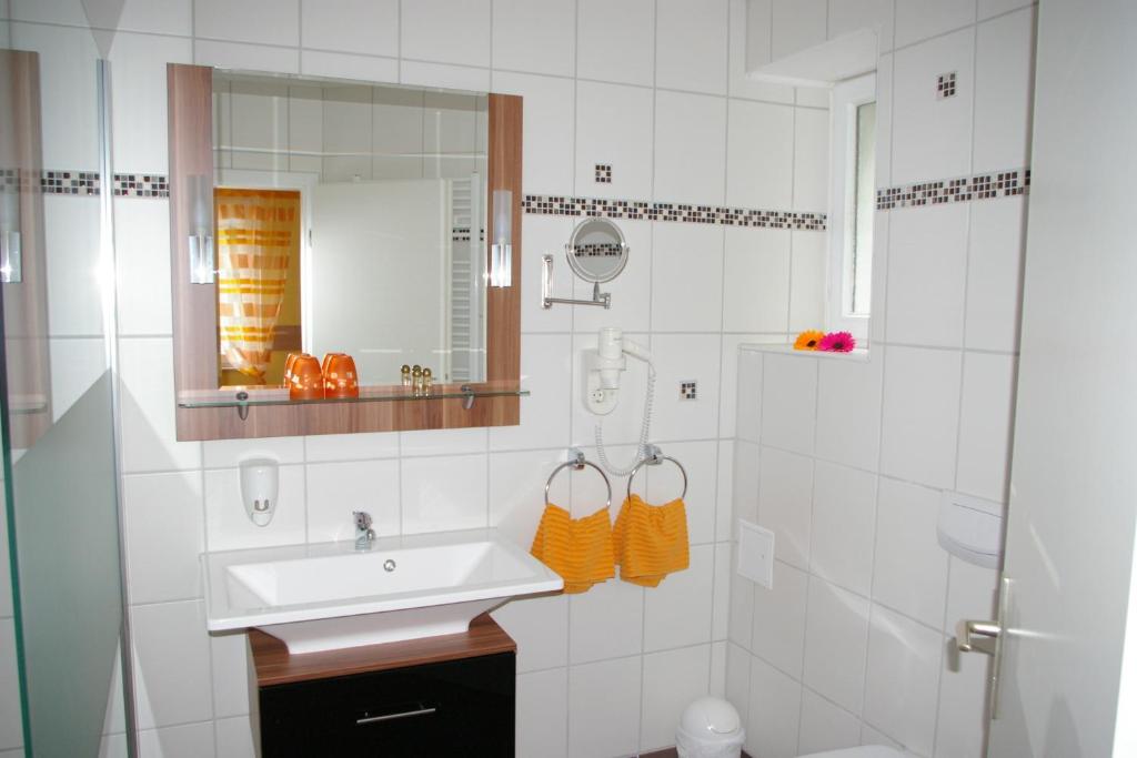 Koupelna v ubytování Hotel Heissinger