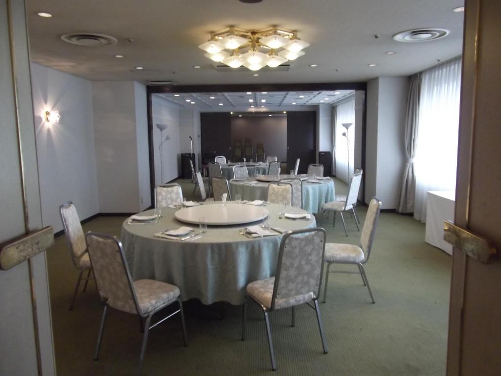 TV a/nebo společenská místnost v ubytování Ichikawa Grand Hotel