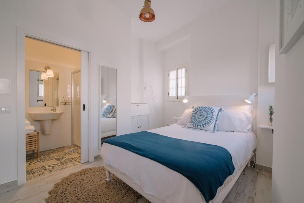 Postel nebo postele na pokoji v ubytování GuestMar