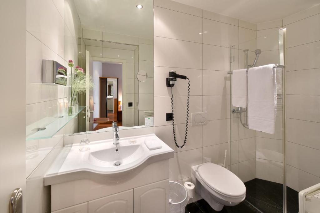 Koupelna v ubytování Apart Hotel Amadeo