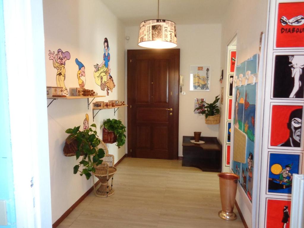 a hallway of a room with a door at Appartamento Fantasia CIR Aosta 0241 in Aosta