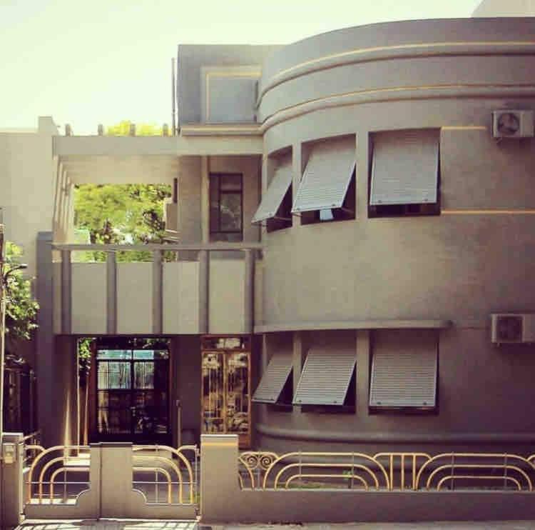 a building with solar panels on the side of it at -Casa Haydée- in Paysandú