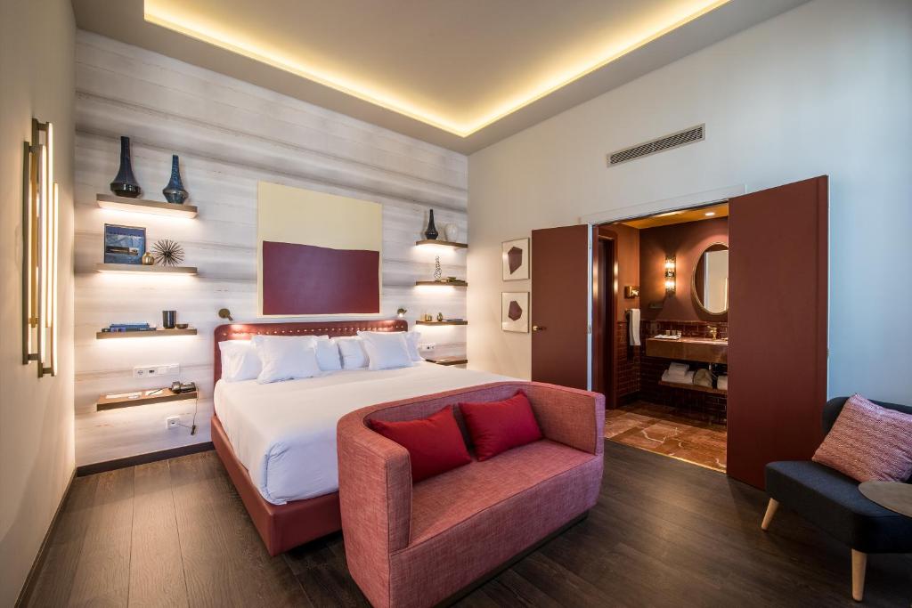 A bed or beds in a room at Vincci Mae