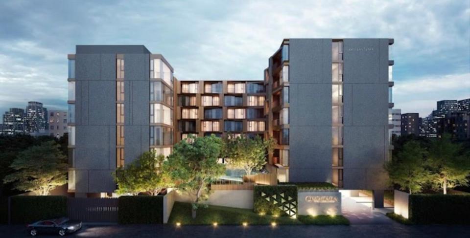 a rendering of a tall building with a parking lot at quintara arte 52,on nut in Bangkok