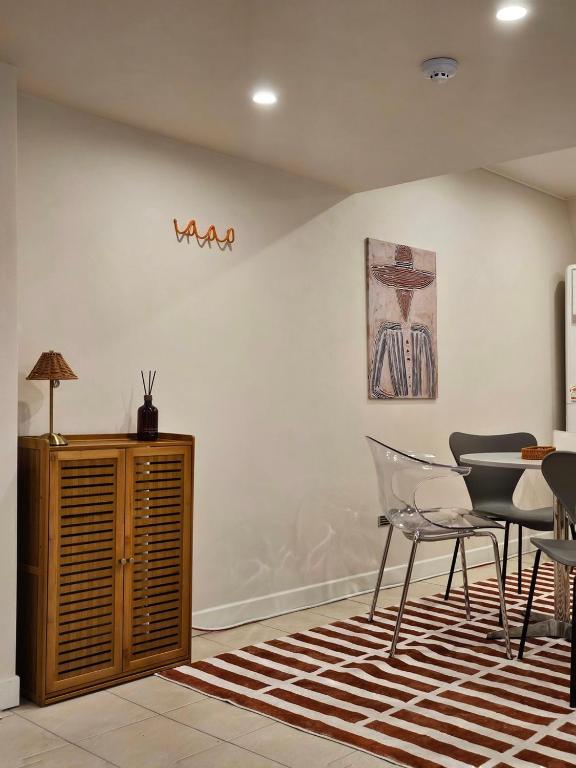 a dining room with a table and chairs at Jeonju Hotel Stay Bok-e in Jeonju