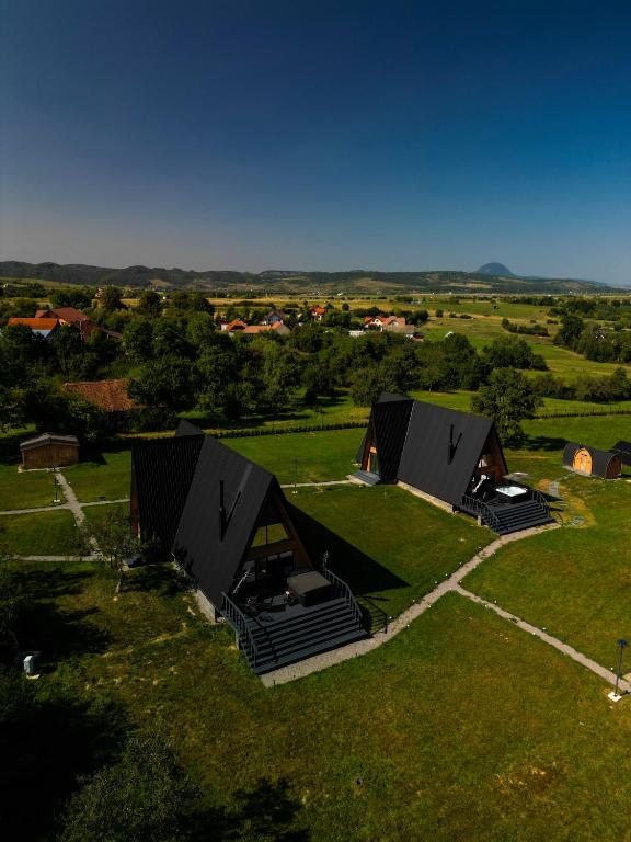 an overhead view of two tents in a field at Vino Chalets Bran in Sohodol