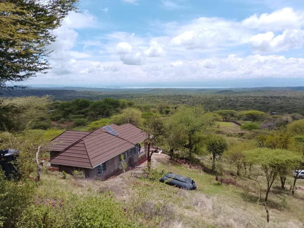 an aerial view of a house in a field at Footprint Baringo in Marigat