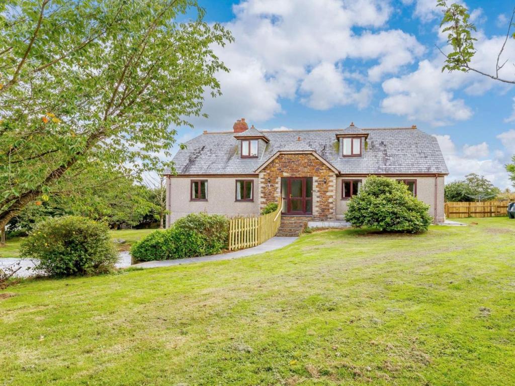 an image of a house with a yard at 4 Bed in Bodmin oc-88543 in Bodmin