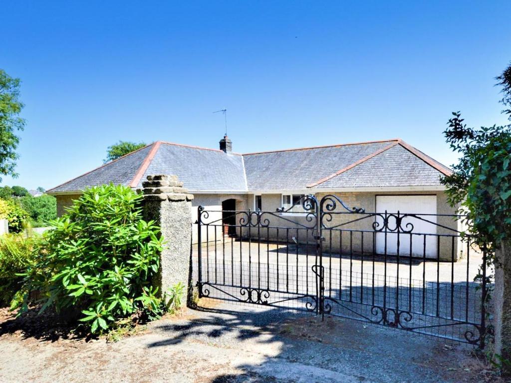 a house with a gate in front of it at 2 Bed in Falmouth oc-tvean in Constantine