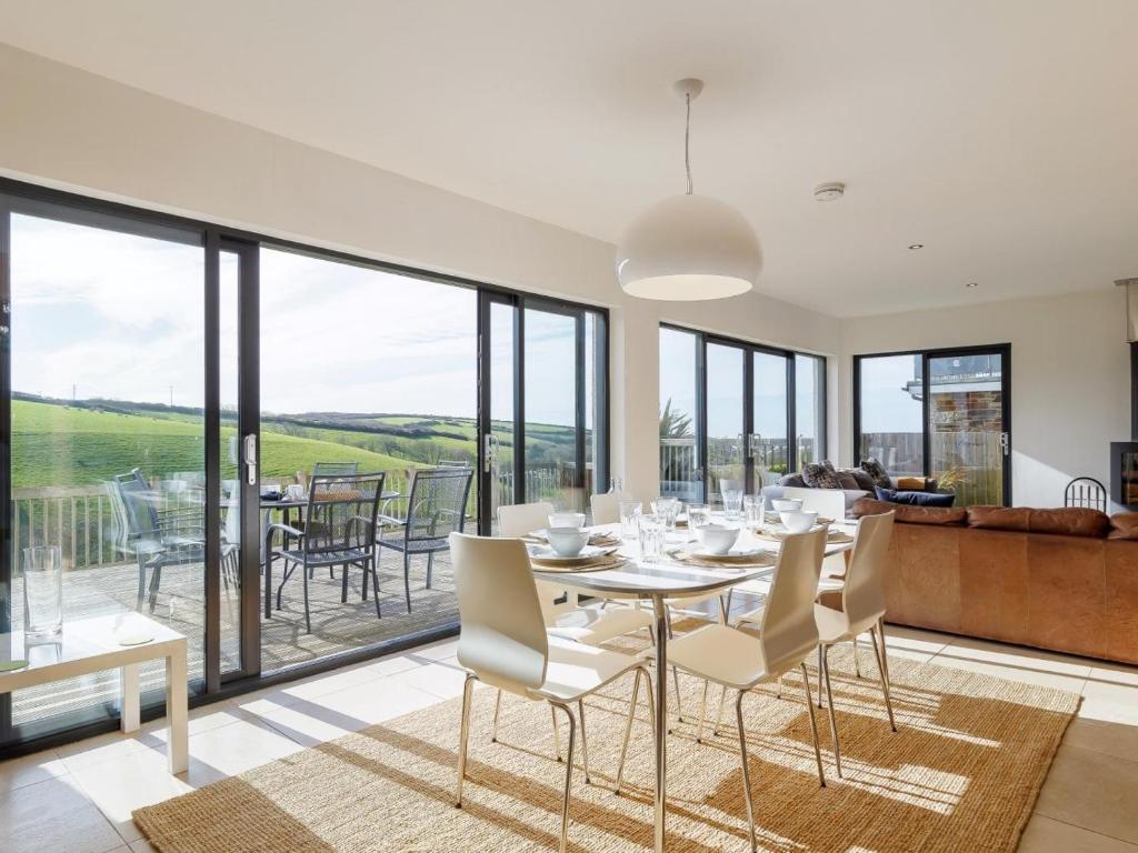 a dining room with a table and chairs at 3 Bed in Crackington Haven oc-78271 in Saint Gennys
