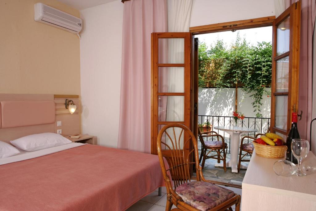 Postel nebo postele na pokoji v ubytování Hotel Calypso