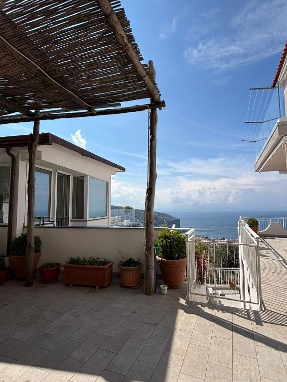 a house with a view of the ocean at La casa di Fiore in Vico Equense