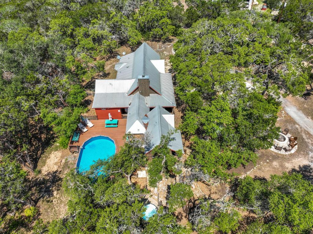 an overhead view of a house in the woods at The Cabin at Rooster Ridge in Fischer