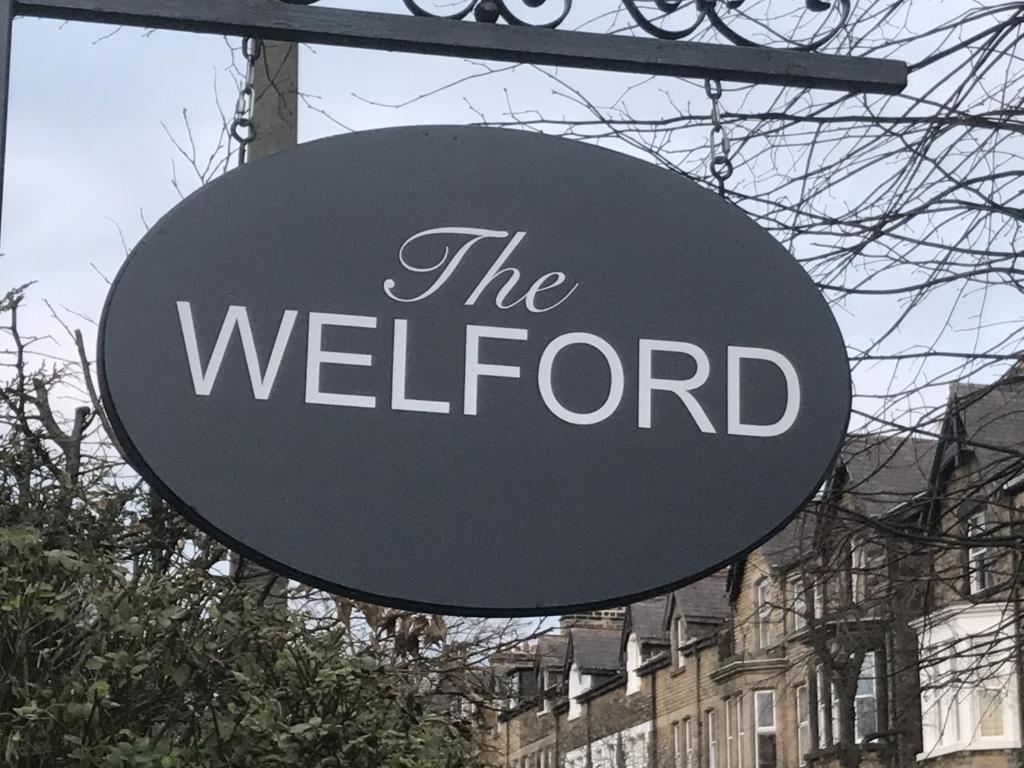 a sign that reads the wellor in front of a building at The Welford in Harrogate